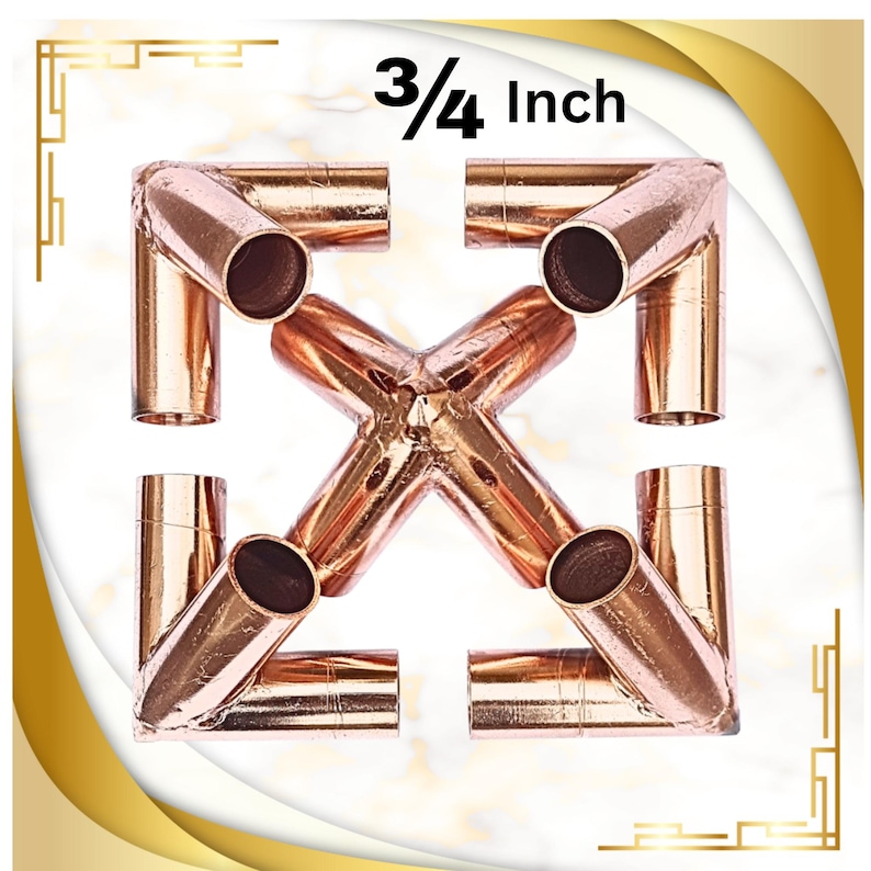 May include: A copper pipe fitting connector with a cross-shaped design featuring four open cylindrical ends and a central junction. The metal surface has a polished finish. The text 3/4 Inch is printed in black above the copper component.