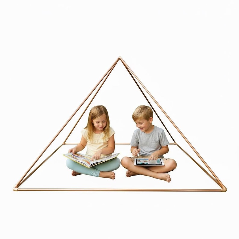 May include: A pyramid-shaped frame constructed from metallic copper-colored pipes. The structure features a square base and four angled sides meeting at a single top point, creating an open, geometric enclosure for indoor play or reading activities.