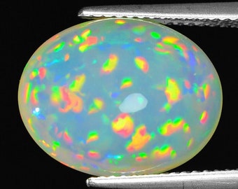 Ópalo etíope ovalado: juego de colores arcoíris blancos naturales (8,50 ct)