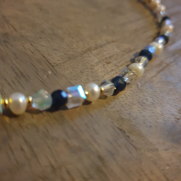 Blauwe saffier collier 4mm, witte zoetwaterparel rvs afwerking 45 cm lengte verstelbaar