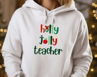 Holly Jolly Teacher Premium Sponge Fleece Hoodie perfect gift for the best teacher in your life.