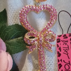 Betsey Johnson Sparkling pink crystal inlay heart bow and key long chain pendant necklace