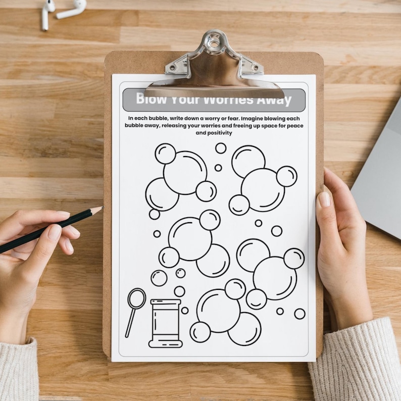 May include: A printable worksheet with the title "Blow your worries away". The worksheet features a series of bubbles with instructions to write down a worry or fear in each bubble and imagine blowing them away.