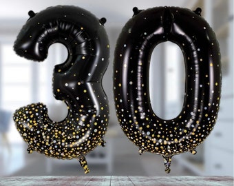 Jumbo sized 34inch age 30 black and gold sparkling birthday party balloons. 30th birthday balloons. Black and gold themed 30th decorations