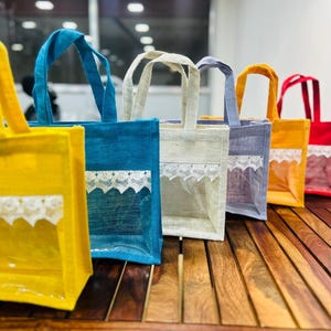 100 Pcs Jute Bags for Return Gifts Thamboolam Bags Wedding Gifts Lunch Bag Multicolor 10*9*5 inches Gifts, Baby Shower Gifts, Housewarming