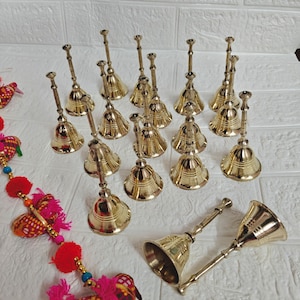 A Lot of Brass Ringing Bells for Guests at a Special Event, Pheras, or ...