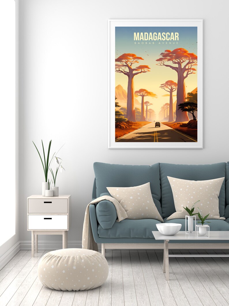 May include: A vintage travel poster with a retro design featuring a road lined with tall baobab trees in Madagascar. The poster has the text "MADAGASCAR BAOBAB AVENUE" at the top.
