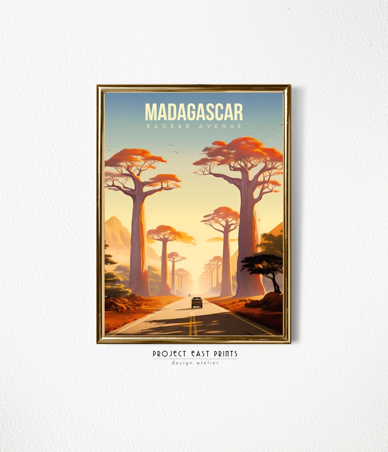 May include: A vintage travel poster with a retro design featuring a road lined with tall baobab trees in Madagascar. The poster reads "Madagascar Baobab Avenue" and "Project East Prints Design Atelier".