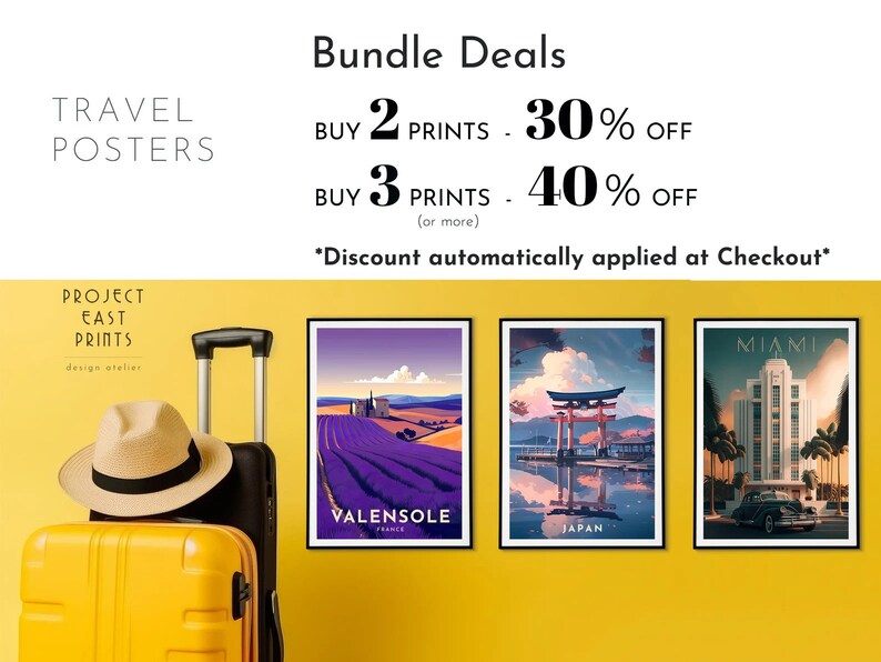 May include: Three travel posters featuring images of Valensole, Japan, and Miami. The posters are framed in black and have the text "Valensole", "Japan", and "Miami" printed on them. A yellow suitcase with a hat on top is positioned in front of the posters. The text above the posters reads "Bundle Deals" and includes information about discounts for buying multiple prints.