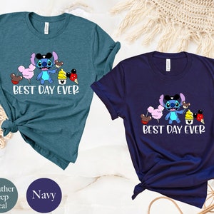 May include: Two t-shirts featuring a blue Stitch character holding various Disney treats. The text "Best Day Ever" is printed on both shirts. The shirts are available in heather deep teal and navy.