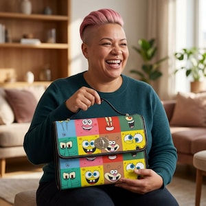 Borsa in tela impermeabile con patchwork di faccine di cartoni animati colorate