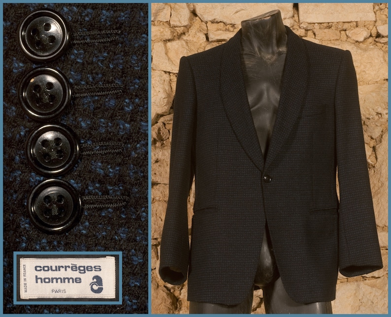 May include: A dark blue blazer with a checkered pattern and a single button closure. The blazer has a label that reads "Courr&egrave;ges homme Paris" and "Made in France".