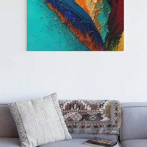May include: Abstract painting with a teal, blue, orange, and brown color scheme. The painting has a textured, layered look, with thick brushstrokes and a gold glitter effect.