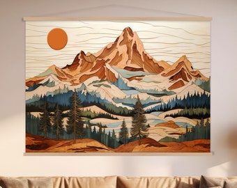 May include: A large wall hanging featuring a mountain landscape with a setting sun. The artwork showcases a mountain range in shades of brown and tan, with green and blue trees and a lake. The artwork is displayed on a wooden frame.