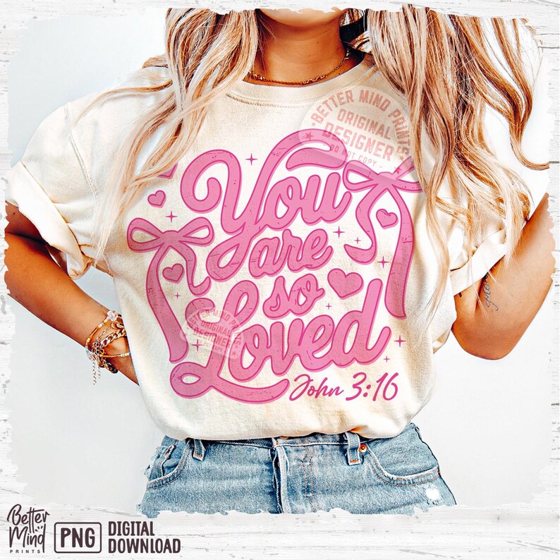 May include: A white t-shirt with a pink graphic that says "You are so Loved" with a heart and a bow. The graphic also includes the text "John 3:16".