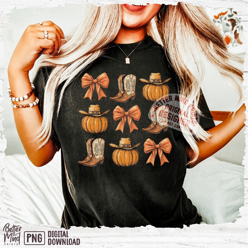 May include: A black t-shirt with a pattern of orange pumpkins, brown cowboy boots, and brown bows. The text "Better Mind Original Designs" is visible on the shirt.