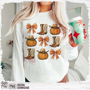 May include: White sweatshirt with a design of pumpkins, cowboy boots, and bows in shades of orange and brown. The text "Original Prints Designer Do Not Copy" is on the bottom left of the sweatshirt.