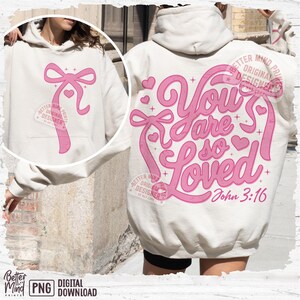 May include: A white hoodie with a pink graphic design that says "You are so loved" with a pink heart and the text "John 3:16".