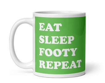 Taza blanca brillante Eat Sleep Football Repeat