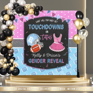 May include: A gender reveal party backdrop with a chalkboard sign that says "What will our baby be? Touchdowns or Tutus? Kelly & Brian's Gender Reveal". The backdrop is decorated with blue and pink footballs and a balloon arch with black, gold, and silver balloons.