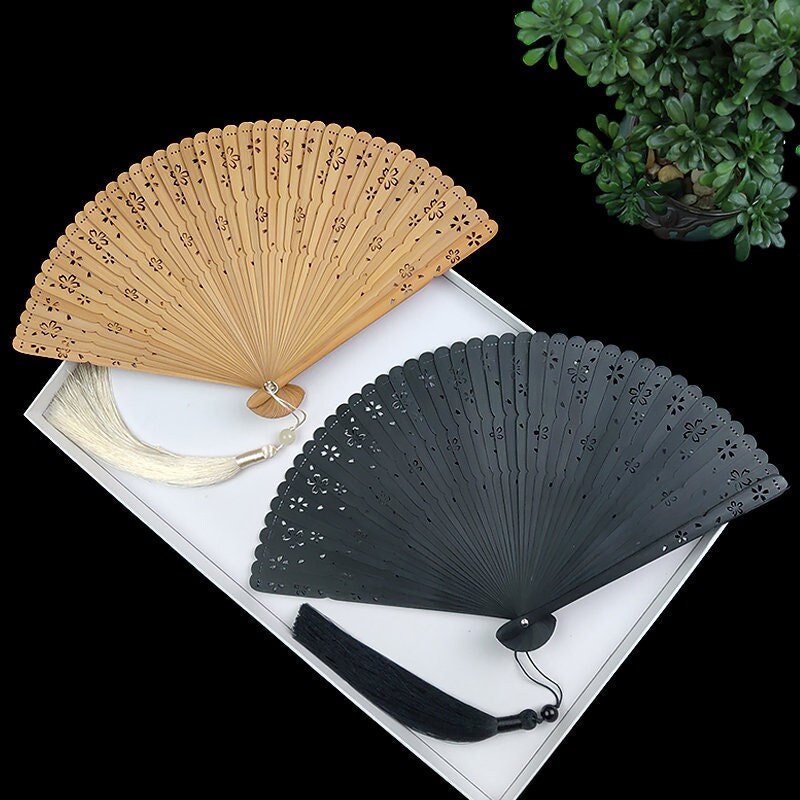 Ventilateur chinois portable en alliage de titane pliable