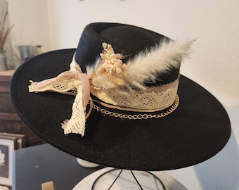 Black  Boho inspired Bolero/ Boater Wide Brim Fedora Hat, taupe chiffon, wide ivory crochet ribbon, leather, chain & boho dried flowers.