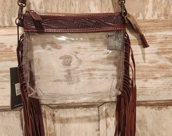 Clear crossbody with brown leather fringe and tooled leather accent.