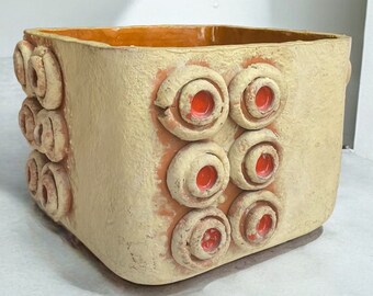 Uniquely vintage, mid century, marked brutalist samott earthenware pottery flowerpot vase with fantastic modernist red glaze embellishments.