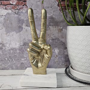 Vintage Gold Tone Metal Peace Hand Figuren on Stone Pedistal