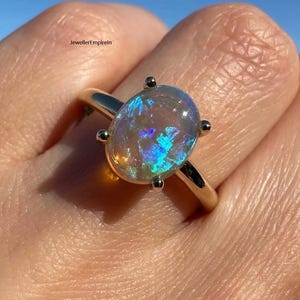 Omen – Dainty October Birthstone Opal Ring for Women.