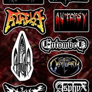 May include: A collection of 10 black and white death metal band logo stickers. The logos include: Aborted, Anaal Nathrakh, At The Gates, Autopsy, Entombed, Obituary, Deicide, Asphyx, and two others.