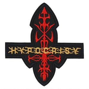 May include: Black embroidered patch with a red and gold stylized cross and the text "HYPOCRISY" in gold.