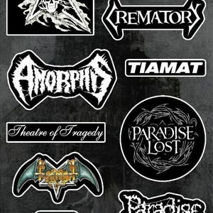 May include: A collection of nine black and white band logo stickers. The logos include "Cemetery", "Amorphis", "Remator", "Tiamat", "Paradise Lost", "Theatre of Tragedy", "Bake of Fears", and "Paradise Lost".