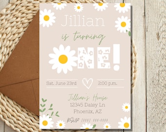 May include: A light brown invitation with white daisies and green leaves. The text reads "Jillian is turning one!" with a daisy-patterned number one. The invitation includes the date, time, address, and RSVP information.