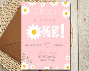 May include: Pink birthday invitation with a daisy design. The invitation says "Jillian is turning one!" with a large daisy in the background. The invitation includes the date, time, and location of the party.