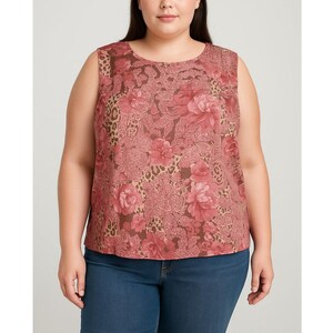 May include: A sleeveless top with a floral pattern in shades of pink and brown. The top features a round neckline and a mix of floral and paisley designs. The fabric has a subtle sheen, and the overall style is feminine and elegant.