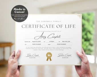 May include: A white certificate of life with gold trim, for Avery Campbell, born on August 23, 2025, at 12:00pm in New York, USA. The certificate is signed by Blake Campbell and Daniel Campbell.