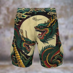 May include: Tan shorts featuring a detailed illustration of two green and red dragons facing each other against a cream-colored backdrop. The design includes yellow accents and a black border with clouds, creating a bold and artistic look.