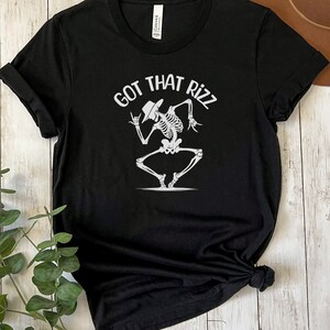 Halloween Shirt | Funny Dancing Skeleton T-Shirt | Spooky Holiday Gift | Fall Witch Coven | Trick or Treat Top | Ironic Tee | Got That Rizz