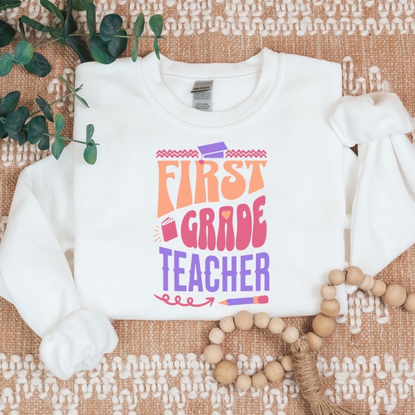 First Grade Teacher Sweatshirt | Graduation Long Sleeve | Rainbow Retro Top | 1st Grade Shirt | Classroom Gift | Groovy Elementary Teach