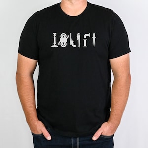 May include: A black t-shirt with a white graphic that says "I &hearts; LIFT" with a series of tools, including a wrench, a hammer, a screwdriver, and a pipe.