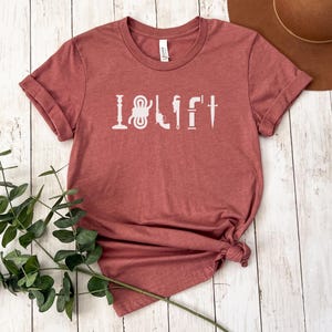 May include: A maroon t-shirt with the text "I  <3  DIY" in white. The text is made up of various tools, including a wrench, a hammer, a screwdriver, and a saw.