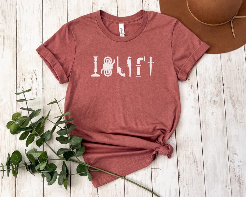 May include: A maroon t-shirt with the text "I  <3  DIY" in white. The text is made up of various tools, including a wrench, a hammer, a screwdriver, and a saw.