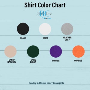 May include: Color chart showing different shirt colors available. Colors include black, white, heather grey, sand, dark green, purple, and orange.