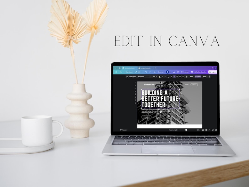 Peut inclure: Un ordinateur portable affichant le site Web Canva avec une conception qui dit "Building a Better Future Together" en texte blanc sur fond noir. La conception pr&eacute;sente &eacute;galement une photo en noir et blanc d'un b&acirc;timent moderne.