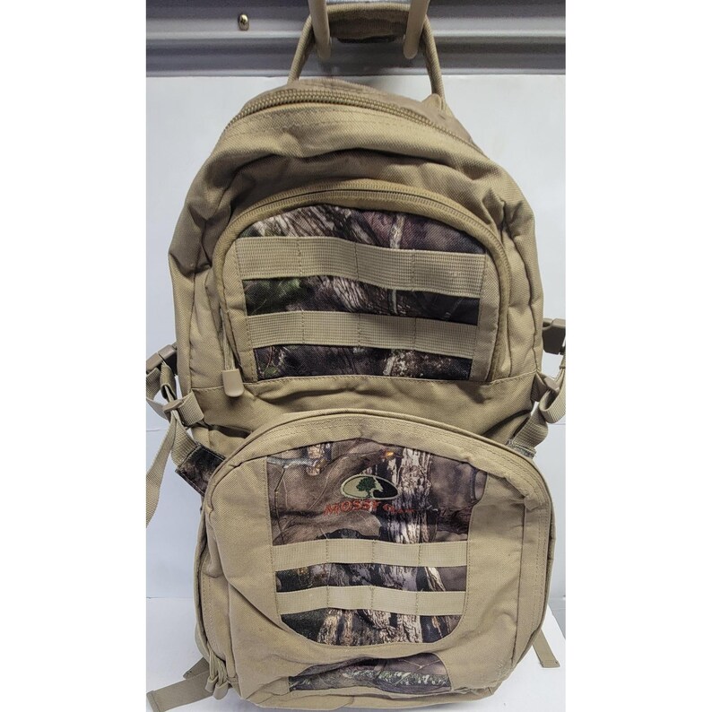 Mochila táctica Fieldline Mossy Oak Camo color canela para caza y senderismo con sistema MOLLE. imagen 17