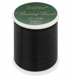 May include: A spool of black beading thread with a white plastic core and a green circular label on top. The label features the text SoNo Beading Thread, Japanese characters, and the length measurement of 100m (110yds.) printed in white and gold.