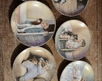 Sete pratos de parede colecionáveis da Bessie Pease Gutman