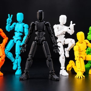 May include: Six articulated action figures in orange, cyan, black, white, yellow, and green. Each figure features a geometric, blocky design with visible joints at the shoulders, elbows, hips, and knees, allowing for various dynamic poses.