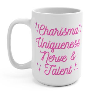 May include: White ceramic mug with a pink design that says "Charisma Uniqueness Nerve & Talent".